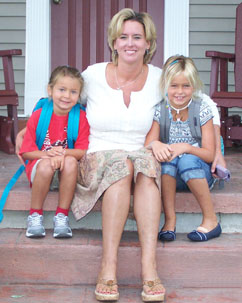 Stephanie Dunn-Haney sits with her daughters Allie (left) and Libby (right) on the girls' first day of school.