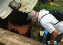 Inspects water storage container for mosquito larvae